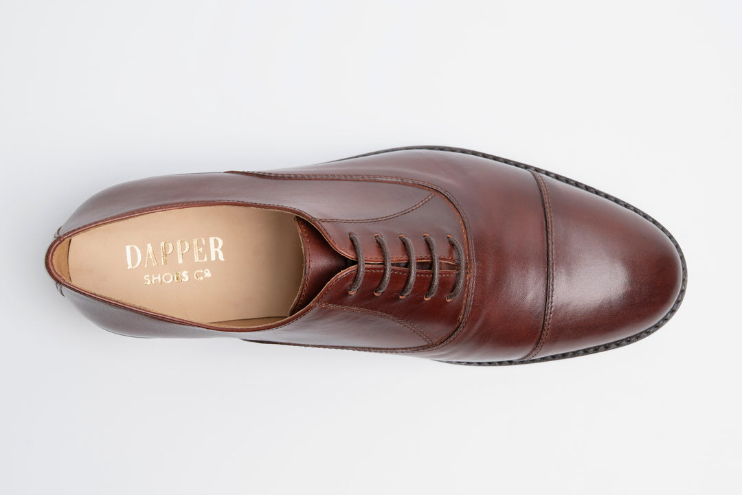 Brown cap toe Oxford — sole and heel view — handcrafted in New Delhi