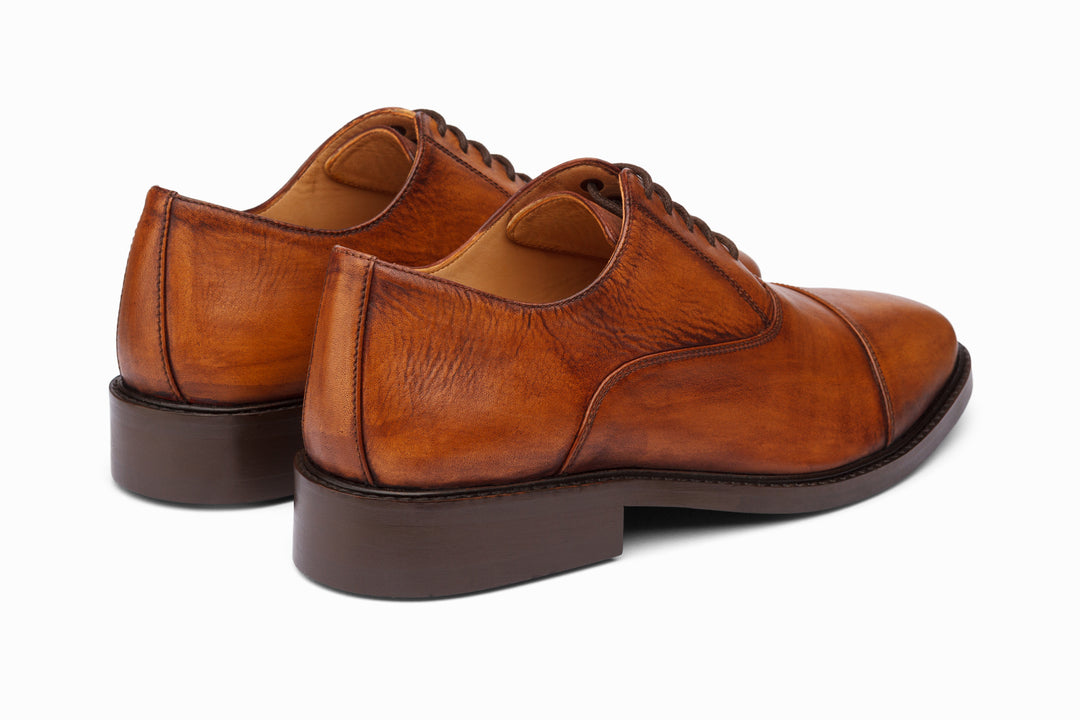 Cap toe Oxford distressed tan patina — three-quarter view — Dapper Shoes Co.