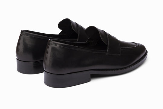 Black penny loafer — three-quarter view — Dapper Shoes Co.
