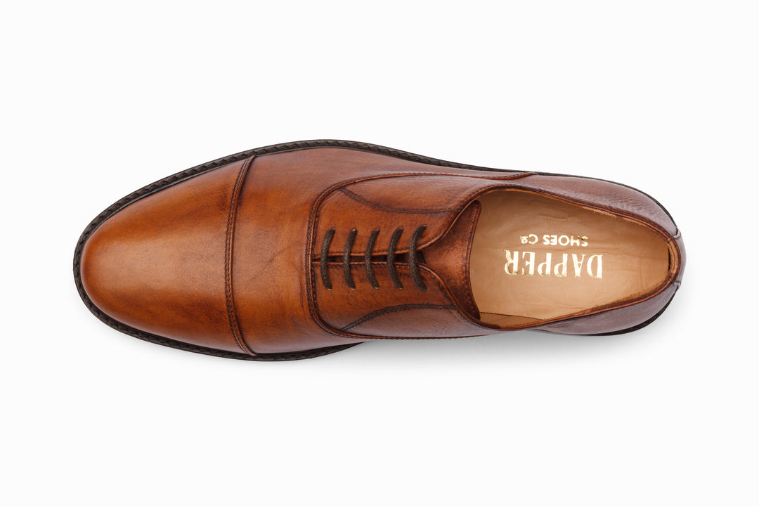 Cap toe Oxford distressed tan patina — sole view — handcrafted in Delhi