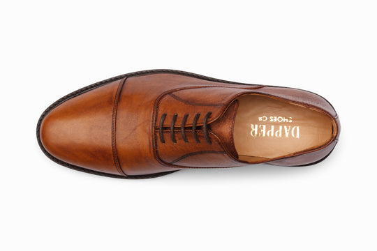 Cap toe Oxford distressed tan patina — sole view — handcrafted in Delhi