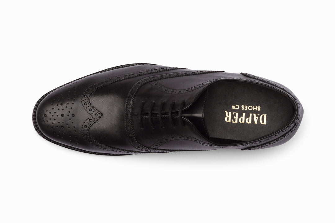 Black full brogue wingtip Oxford — sole view — handcrafted in Delhi