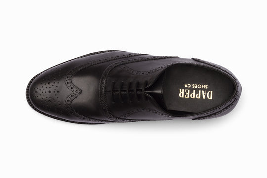 Black full brogue wingtip Oxford — sole view — handcrafted in Delhi