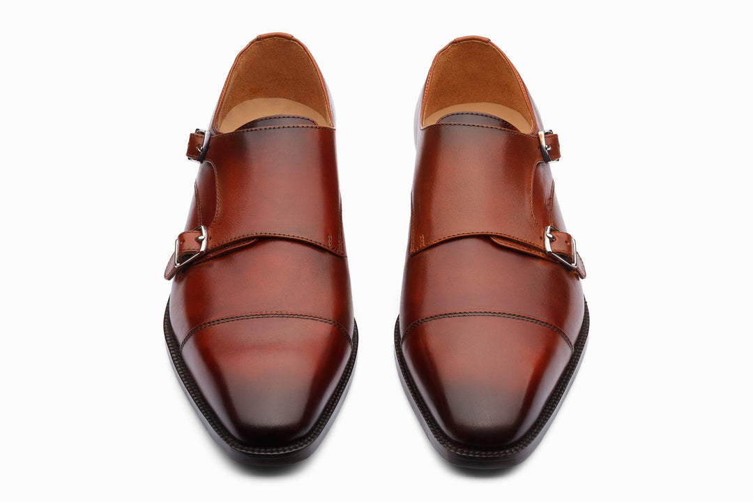 Cognac double monk strap shoes — side profile — handcrafted leather