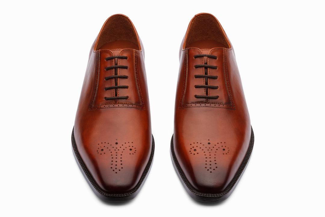 Antique tan patina medallion Oxford — side profile — handcrafted leather shoes India