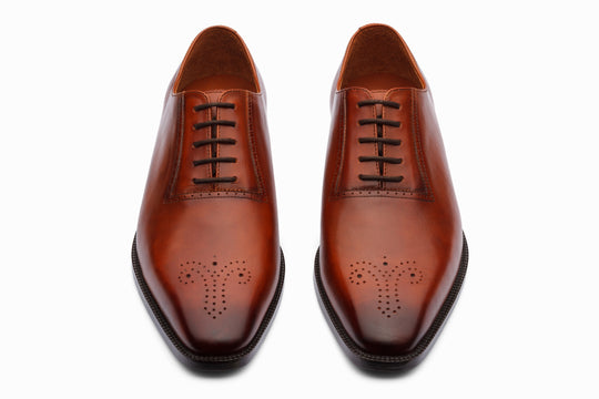 Antique tan patina medallion Oxford — side profile — handcrafted leather shoes India
