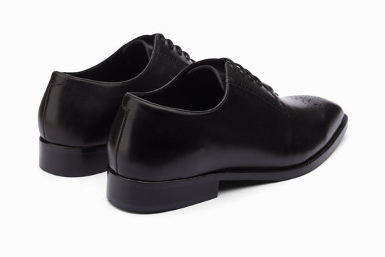 Black medallion Oxford — top-down view — handcrafted in New Delhi