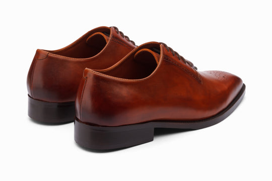 Antique tan patina medallion Oxford — top-down view — handcrafted in New Delhi
