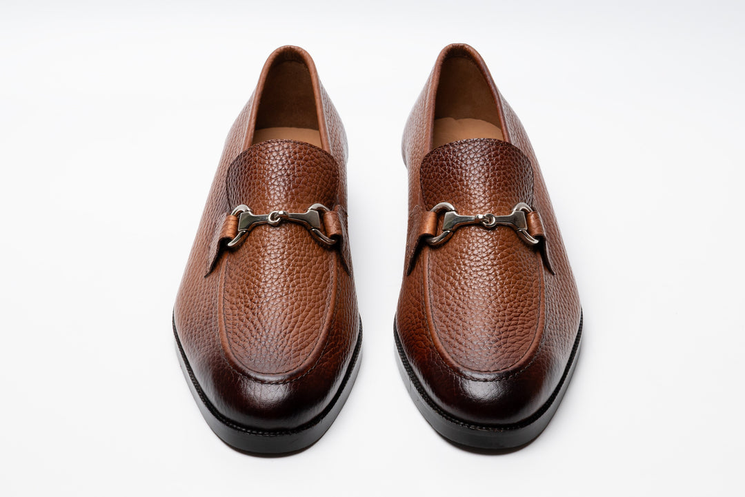 Tan horsebit loafers — side profile — milled grain leather India