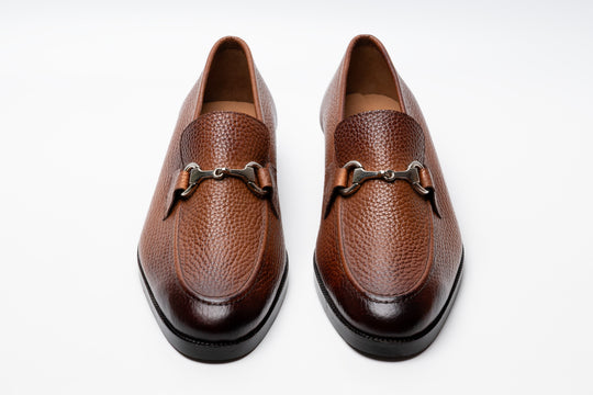Tan horsebit loafers — side profile — milled grain leather India