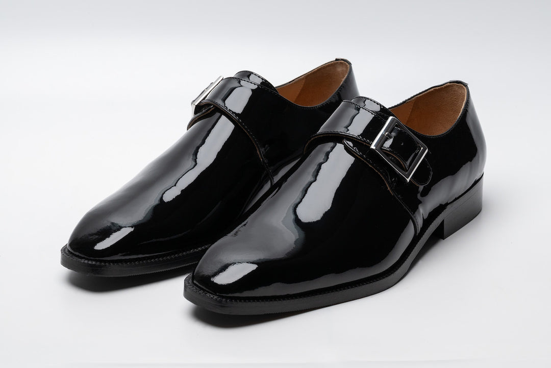 Medallion Single Monkstrap in patent black leather — front view — Dapper Shoes Co.