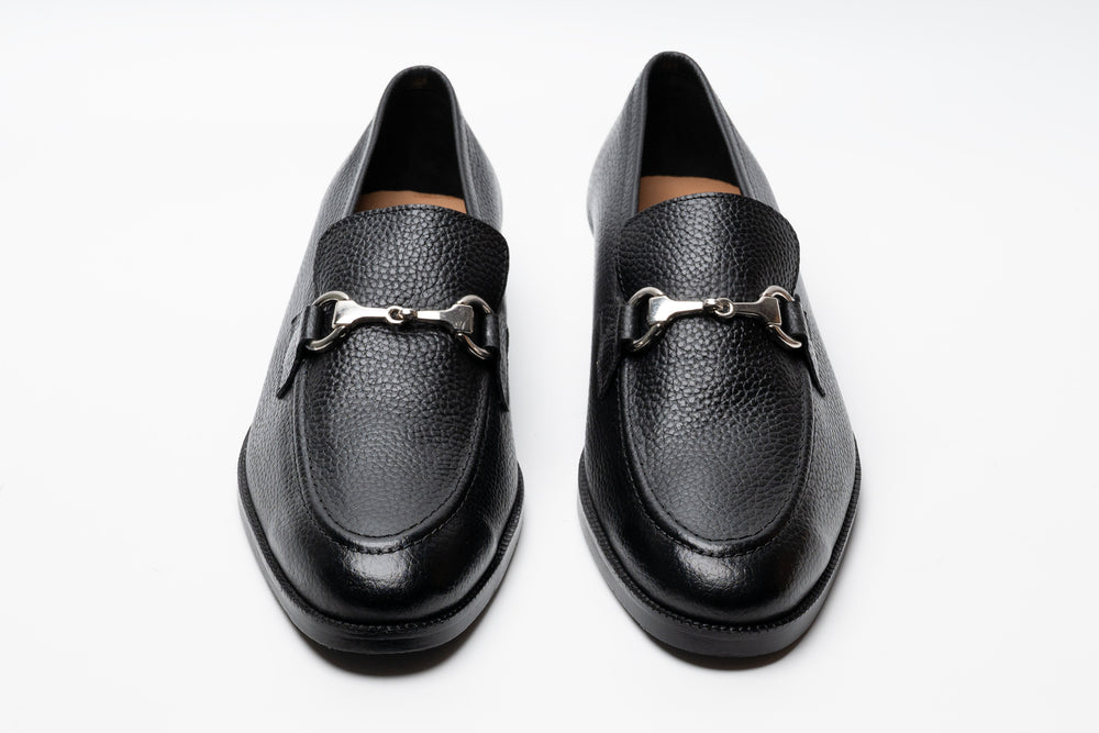 Black horsebit loafers — side profile — milled grain leather India