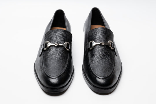 Black horsebit loafers — side profile — milled grain leather India