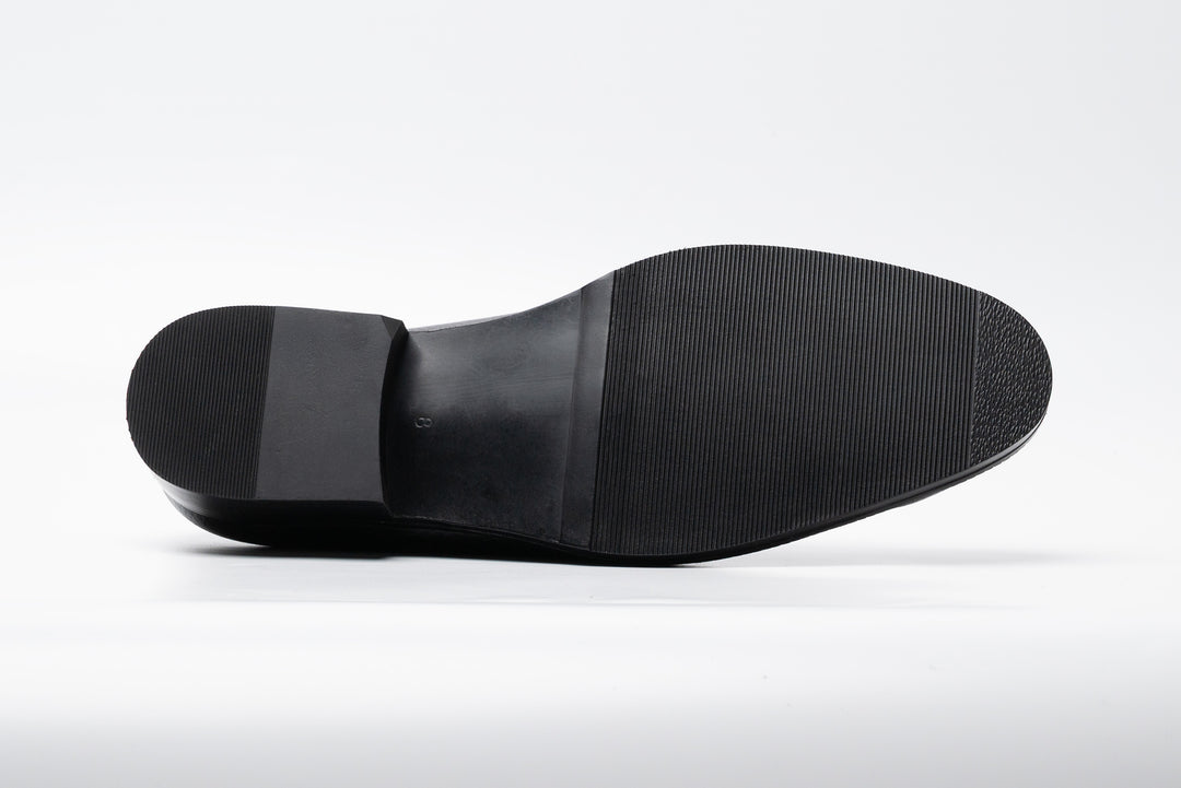 Black milled leather horsebit loafer — sole view — handcrafted in New Delhi