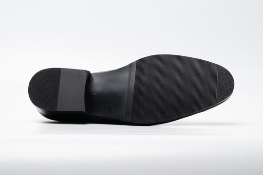 Black milled leather horsebit loafer — sole view — handcrafted in New Delhi