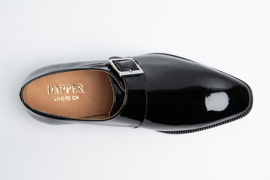 Patent black medallion monkstrap — lifestyle worn on feet — Dapper Shoes Co.