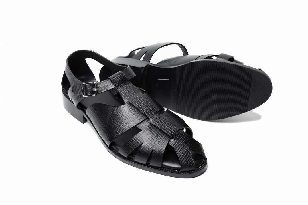 Fisherman Sandal in Black Hatch Grain leather - angled view