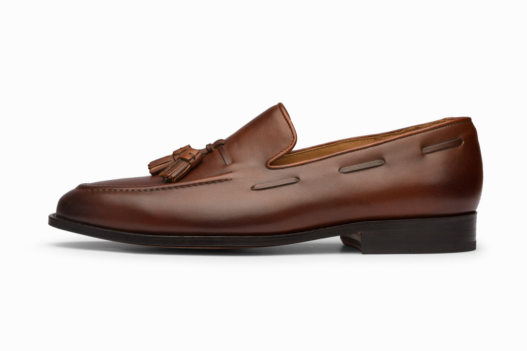 Brown tassel loafers — top-down view — handcrafted men&